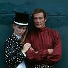 Roger Moore and Kristina Wayborn in Octopussy (1983)