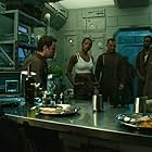 Mike Dopud, Anthony Lemke, Ronnie Rowe, Melissa O'Neil, Alex Mallari Jr., and Melanie Liburd in Dark Matter (2015)