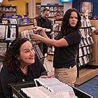 Melissa Fumero and Olga Merediz in Blockbuster (2022)