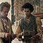 Hugh Laurie and Dev Patel in The Personal History of David Copperfield (2019)