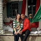 Antwon Tanner and Danneel Ackles in The Christmas Contract (2018)