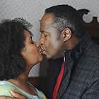 Still of Kim Roberts and Isiah Whitlock Jr. in Lucky 7 