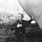 Henry Selick stands with a 20-foot diameter peach on the live-action set at Treasure Island in northern California.