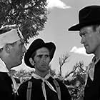 Harry Dean Stanton, Chuck Connors, and George N. Neise in Tomahawk Trail (1957)