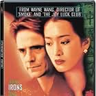 Gong Li and Jeremy Irons in Chinese Box (1997)