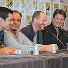 Nathan Fillion, Sean Maher, Tim Minear, and Joss Whedon at an event for Firefly (2002)