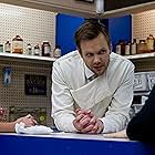 Lauren Weedman and Joel McHale talk with director Jillian Armenante between takes of Kittens in a Cage.