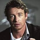 SIMON BAKER stars as Max Rourke, Rachel Keller's boss and friend, who learns the truth about Samara too late in DreamWorks Pictures' horror thriller THE RING TWO.