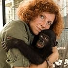 Naturalist Claudine Andre with one of the hundreds of orphaned and rescued bonobos that her Lola Ya Bonobo center rehabilitates and releases back into the wilds of the Congo.