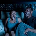 Marlon Wayans and Essence Atkins in A Haunted House (2013)