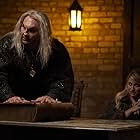 Dave Bautista and Alexandra Henrikson in What We Do in the Shadows (2019)