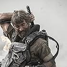 Sharlto Copley in Elysium (2013)