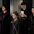 Samantha Morton, Jenn Murray, Ezra Miller, and Faith Wood-Blagrove in Fantastic Beasts and Where to Find Them (2016)