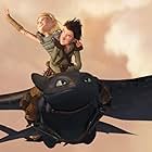 Jay Baruchel, Randy Thom, and America Ferrera in How to Train Your Dragon (2010)