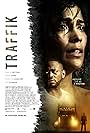 Omar Epps and Paula Patton in Traffik (2018)