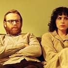 Brian Gleeson and Desiree Akhavan in The Bisexual (2018)