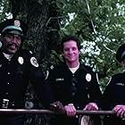 Kim Cattrall, Steve Guttenberg, and Bubba Smith in Police Academy (1984)