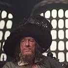 Geoffrey Rush in Pirates of the Caribbean: The Curse of the Black Pearl (2003)