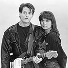 Michael Paré and Marina Orsini in Eddie and the Cruisers II: Eddie Lives! (1989)