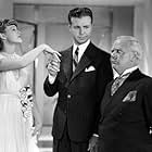 Dick Powell, Penny Singleton, and Charles Winninger in Hard to Get (1938)