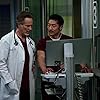 Steven Weber and Brian Tee in End of the Day, Anything Can Happen (2022)