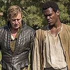 Jason Flemyng and Abubakar Salim in Jamestown (2017)