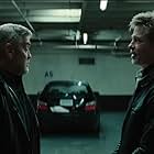 Brad Pitt and George Clooney in Wolfs (2024)