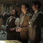 Dan Fogler, Matthew Goode, and Miles Teller in The Offer (2022)