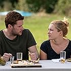 Jack Reynor and Florence Pugh in Midsommar (2019)