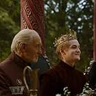 Charles Dance and Jack Gleeson in Game of Thrones (2011)