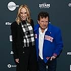 Michael J. Fox and Tracy Pollan at an event for Still: A Michael J. Fox Movie (2023)