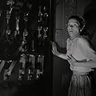 Dorothy Adams in The Devil Commands (1941)