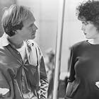 Elizabeth McGovern and Will Patton in A Shock to the System (1990)