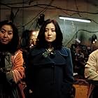 Lee Yeong-ae, Kim Bu-seon, and Ko Chang-seok in Lady Vengeance (2005)