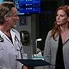 Steven Weber and Sarah Rafferty in No Good Deed Goes Unpunished... in Chicago (2022)