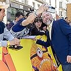 Posing with fans at the Paris premiere of Despicable Me 4