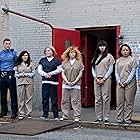 Kate Mulgrew, Natasha Lyonne, Selenis Leyva, Yael Stone, Josh Segarra, Jackie Cruz, and Nick Dillenburg in Orange Is the New Black (2013)