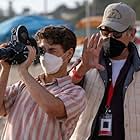 still of Gabriel LaBelle and Steven Spielberg on set of The Fabelmans