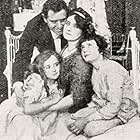 Kenneth Casey, Adele DeGarde, Julia Swayne Gordon, and Tefft Johnson in Hungry Hearts; or, the Children of Social Favorites (1911)