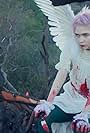 Grimes: Flesh Without Blood/Life in the Vivid Dream (2015)