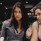 Janina Gavankar and Ashley Rideaux in Punching and Stealing (2020)