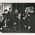 Boris Karloff, Dorothy Adams, Lester Allen, Wheaton Chambers, Anne Revere, Cy Schindell, and Shirley Warde in The Devil Commands (1941)