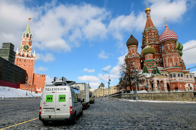 RT vans parked outside the Kremlin