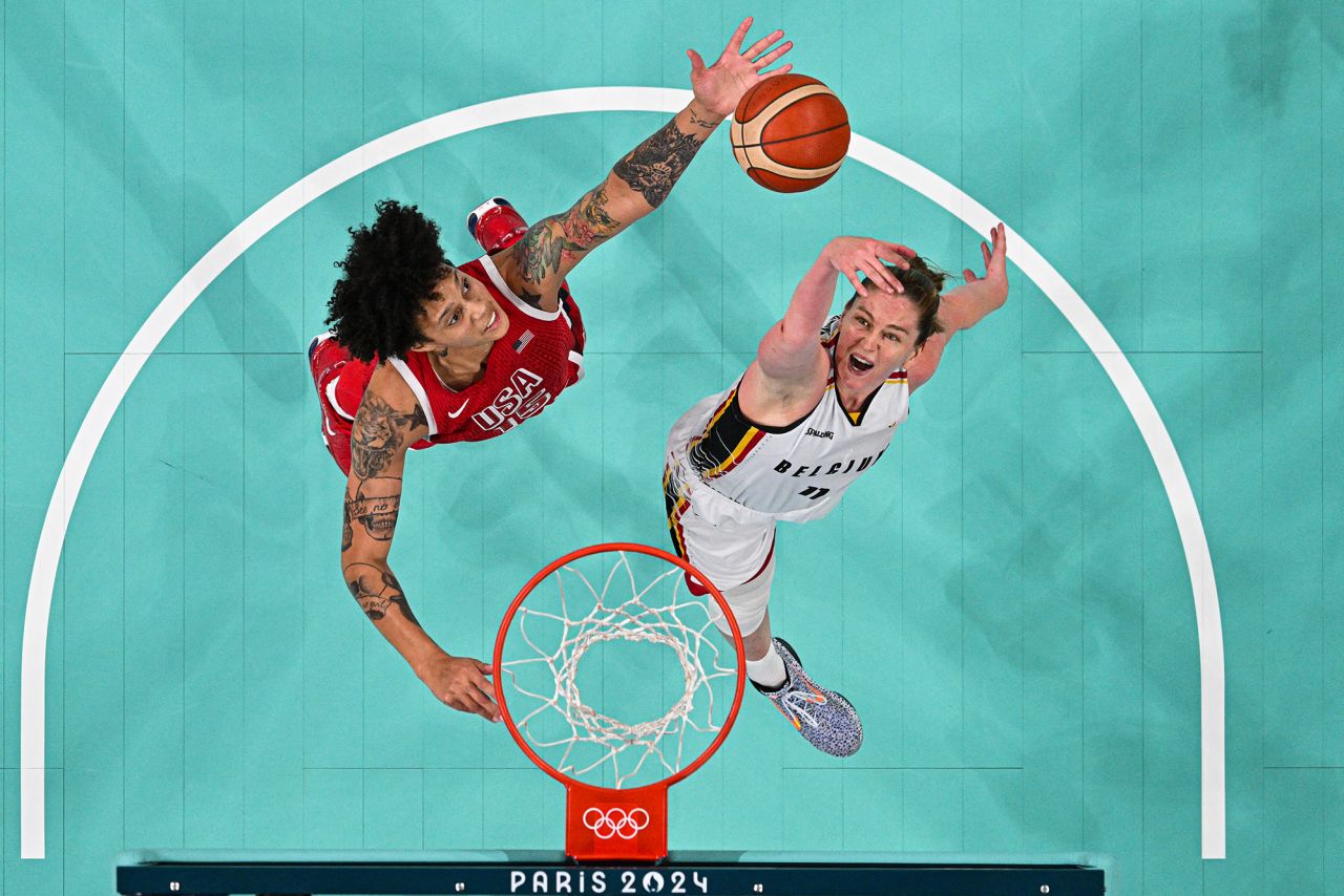 An overview shows USA's #15 Brittney Griner (L) and Belgium's #11 Emma Meesseman go for a rebound in the women's preliminary round group C basketball match at the Pierre-Mauroy stadium in Villeneuve-d'Ascq, northern France, on August 1.