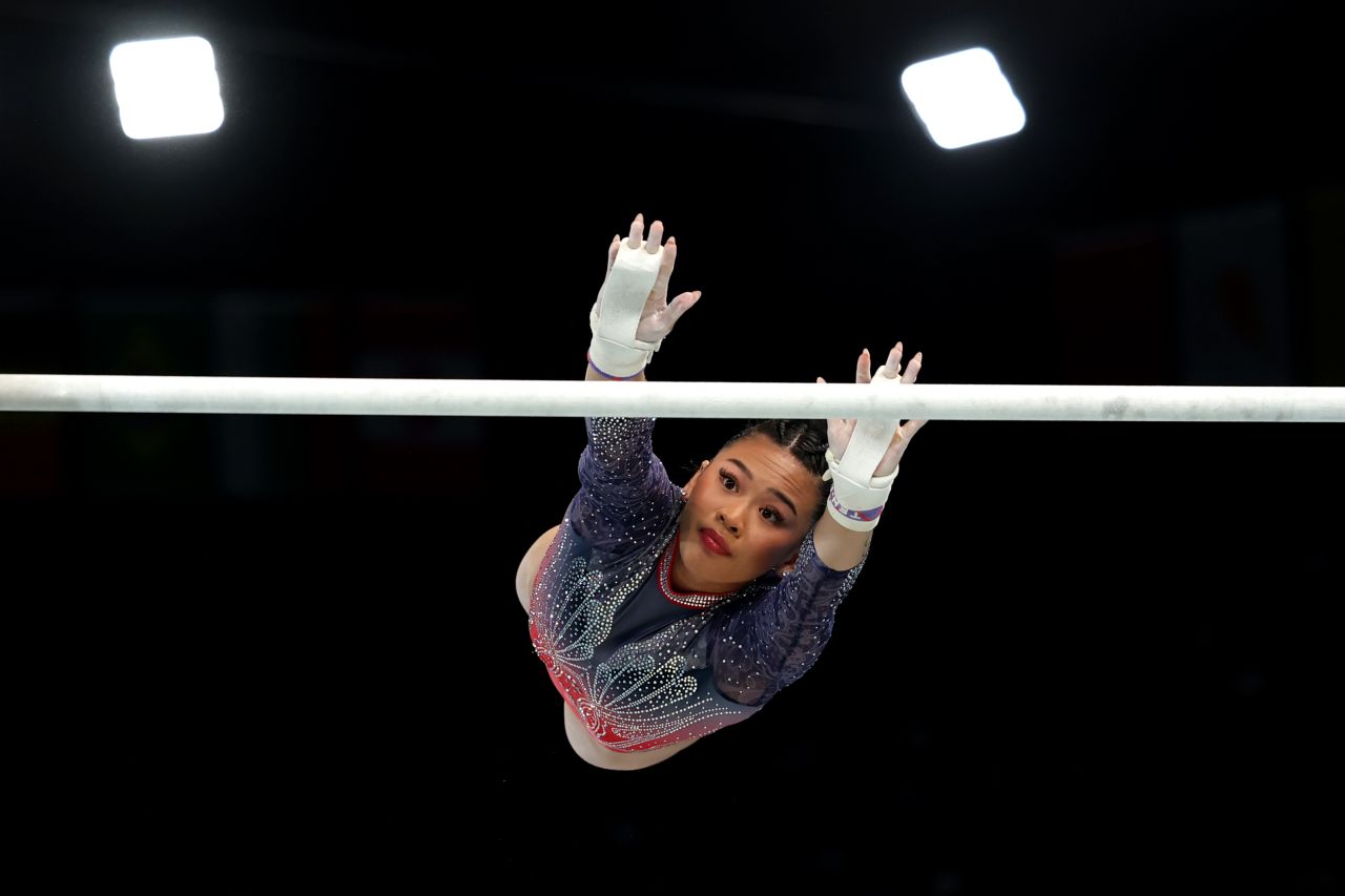 Suni Lee competes on the uneven bars on Thursday.