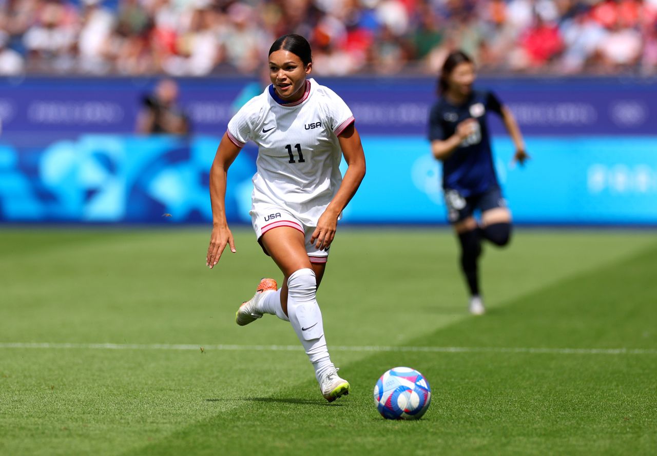 USA’s Sophia Smith runs with the ball during the first half of the quarterfinal match against Japan on August 3. 