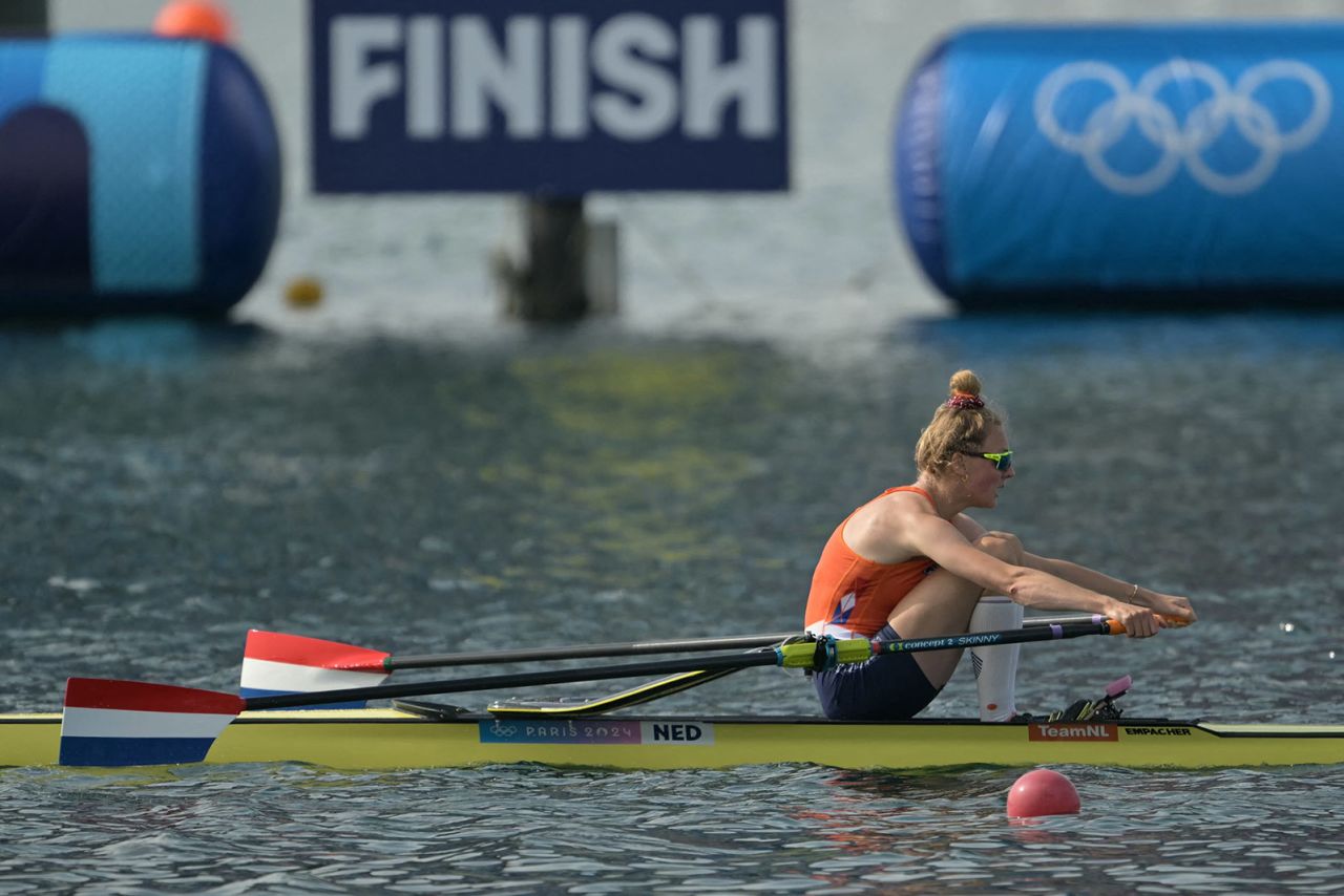 Netherlands' gold medallist Karolien Florijn crosses the finish line in first place in the women's single sculls final on August 3.