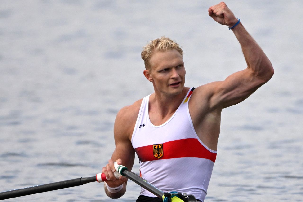 Germany's gold medallist Oliver Zeidler celebrates winning in the men's single sculls final rowing on August 3. 