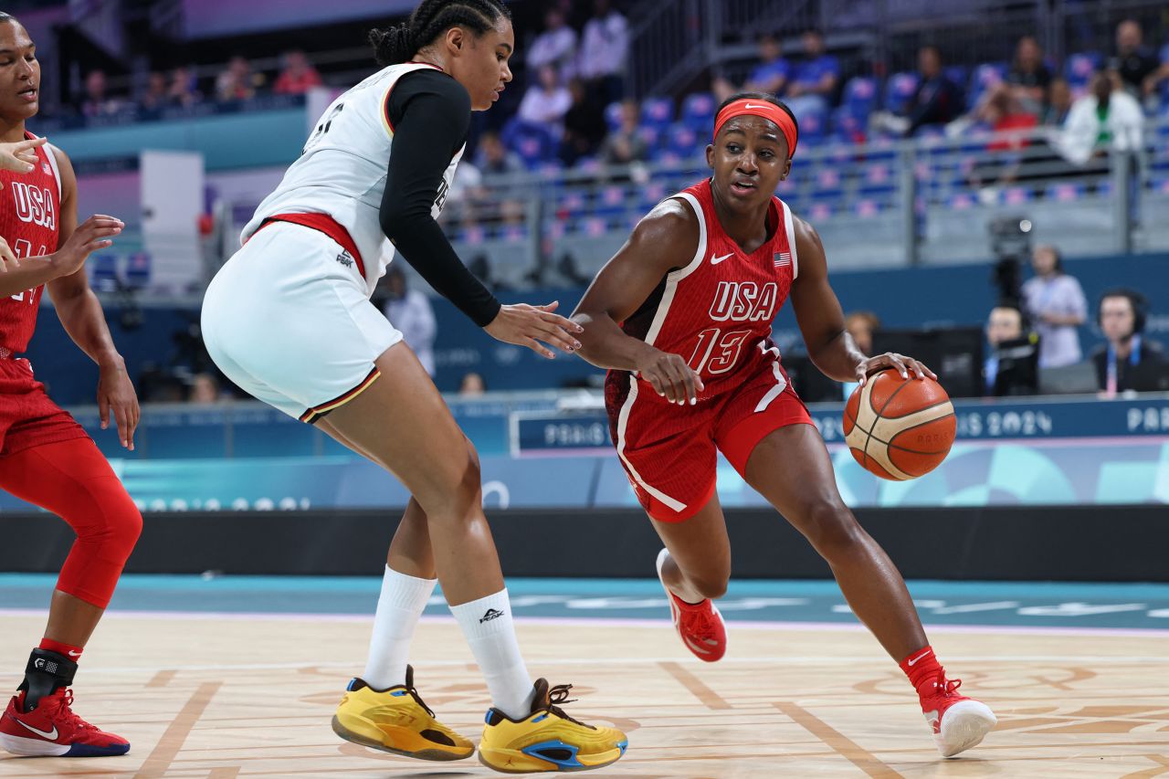 US basketball player Jackie Young works around Germany’s Satou Sabally during a preliminary round game on August 4.