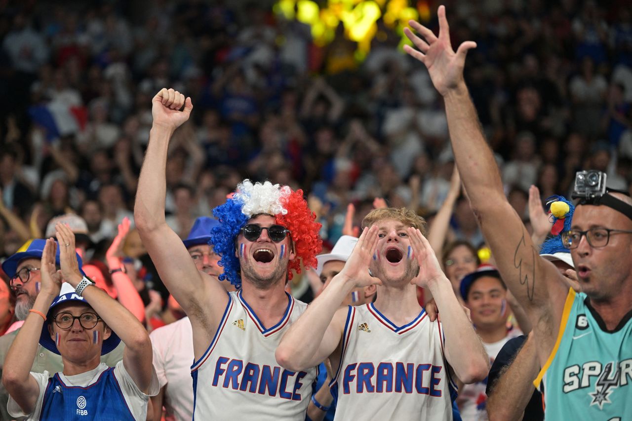 Fans are seen prior to the men's quarterfinal basketball match between France and Canada on Tuesday.